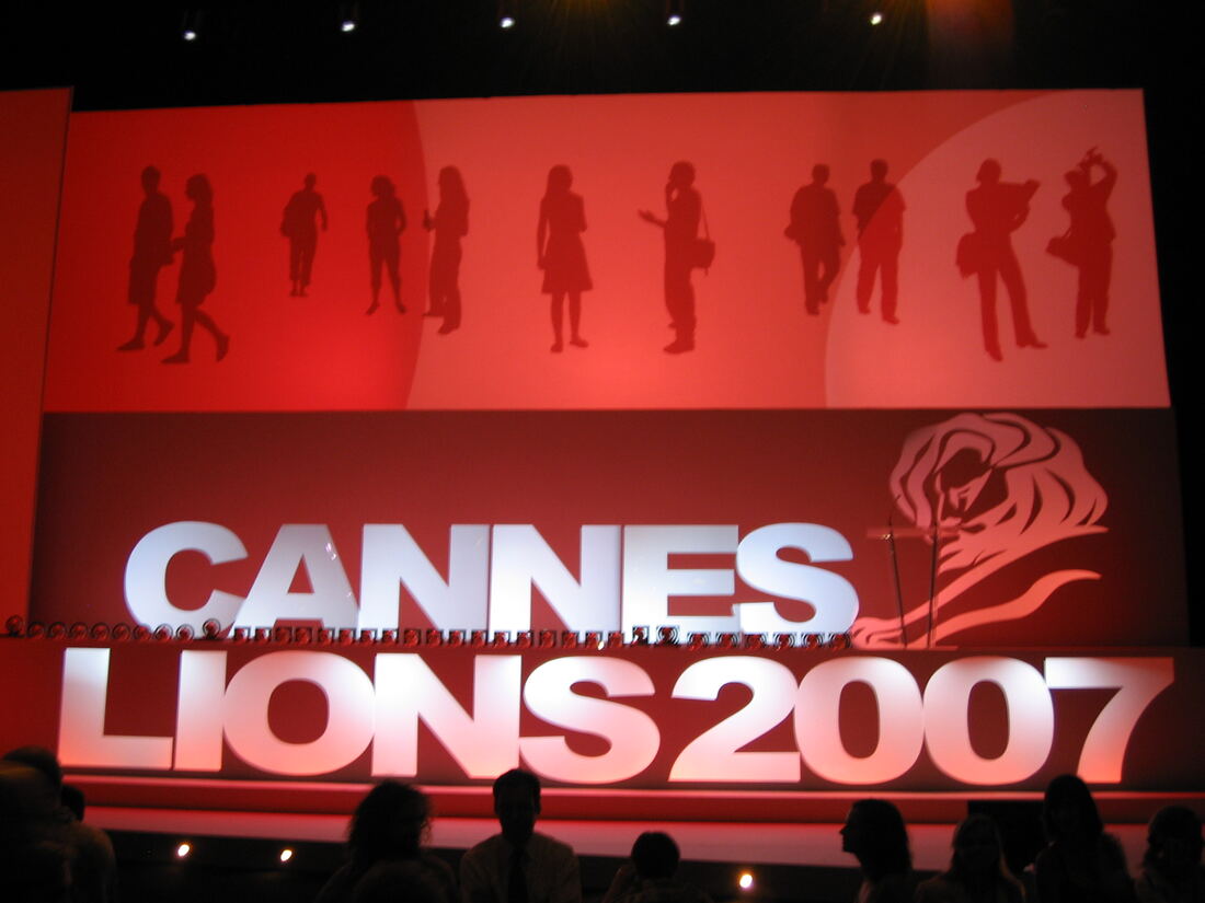 The Cannes Lions 2007 awards stage with glowing letters and silhouetted audience